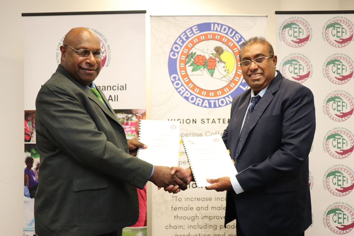 CIC Acting Chief Executive Officer Charles Dambui (left) and CEFI Executive Director Saliya Ranasinghe shake hands to acknowledge the two organisations partnership in the MoU